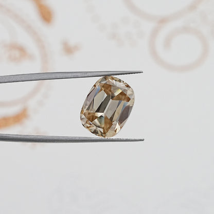 In Tweezer View Of Old Mine Cushion Cut Loose Moissanite Stone