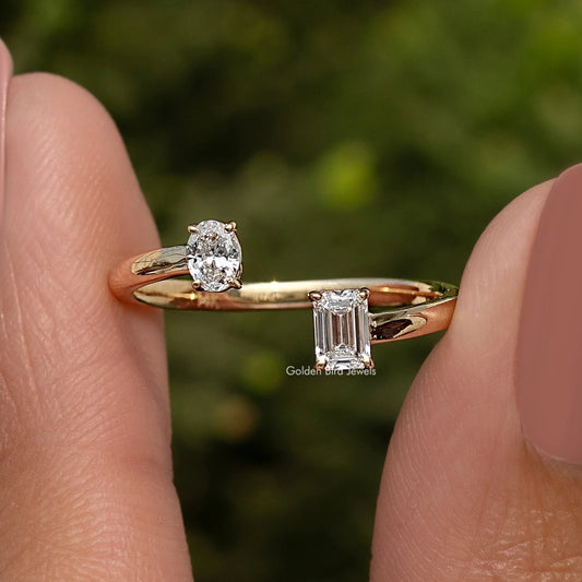 Side view of gold open cuff ring with round and emerald-cut lab diamonds