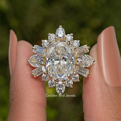 Oval center moissanite halo ring with round and baguette accents, silver-tone