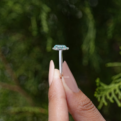 Sterling silver oval moissanite halo ring, front view with raised setting