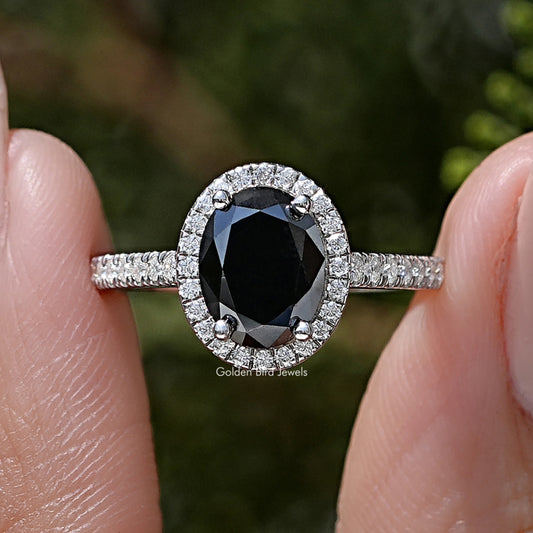 Black oval moissanite halo accent wedding ring in silver