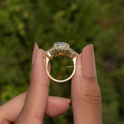 Oval moissanite halo engagement ring, prong-set profile with baguette stones, metal-tone