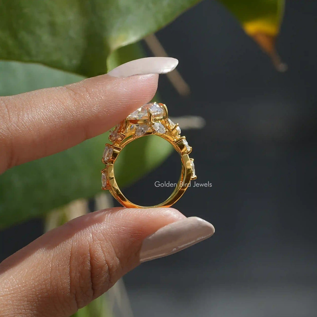 Back View of Crushed Ice Oval Cut Moissanite Leaf Style Wedding Ring In finger