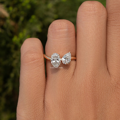 Gold toi et moi ring with oval and pear-cut lab diamonds, two-stone split shank