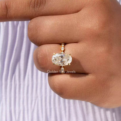 Detailed View Of Moissanite Oval Cut Hidden Halo Ring In Yellow Gold