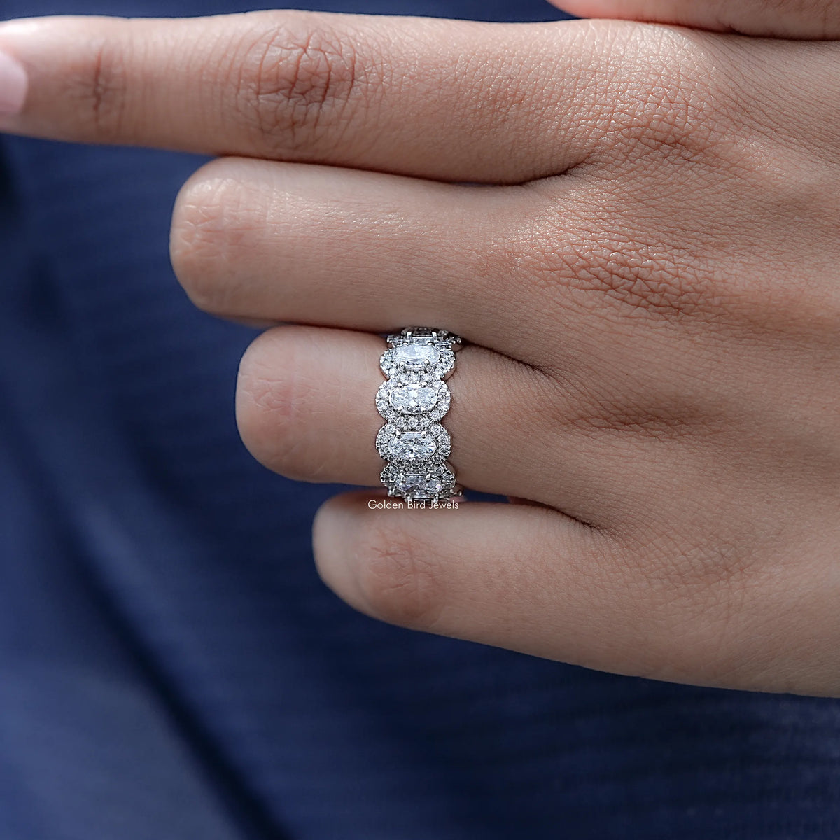 Detailed view of Oval Cut Lab Diamond Seven Stone Halo Band
