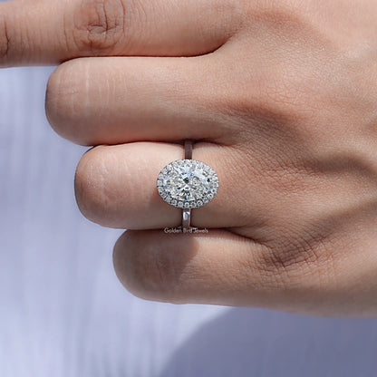 Close View Of Oval Lab Diamond Halo Engagement Ring