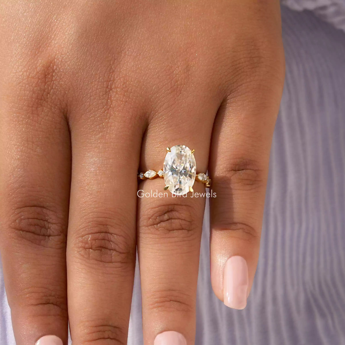 Oval Cut Wedding Ring In Prong Set In finger