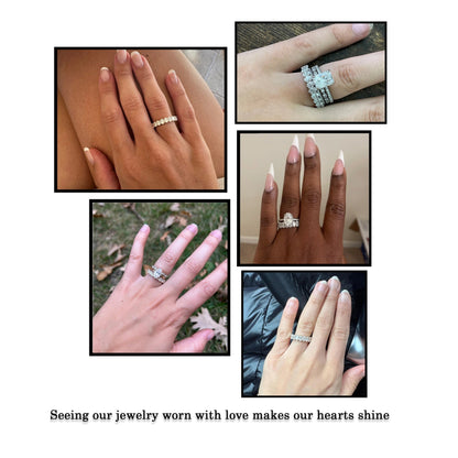 Oval-cut moissanite half-eternity wedding band worn on hand, sparkling oval stones