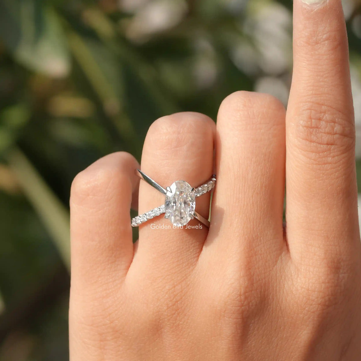 View of Split Shank Oval Cut Moissanite Engagement Ring In White Gold