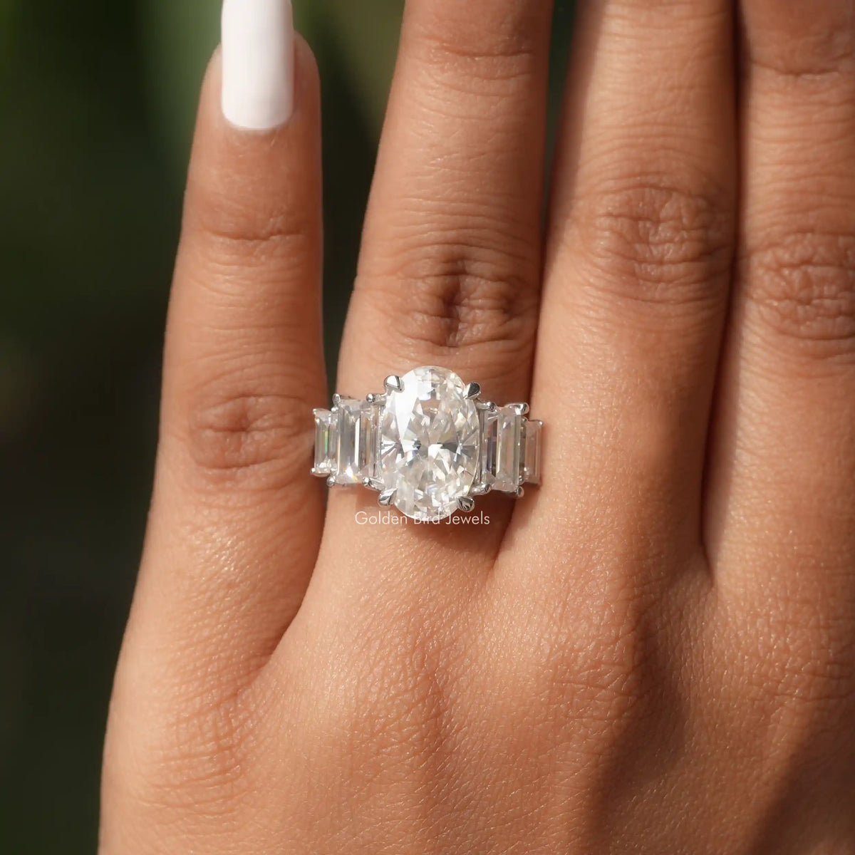 Detailed View Of Moissanite Oval And Baguette Cut Ring In White Gold