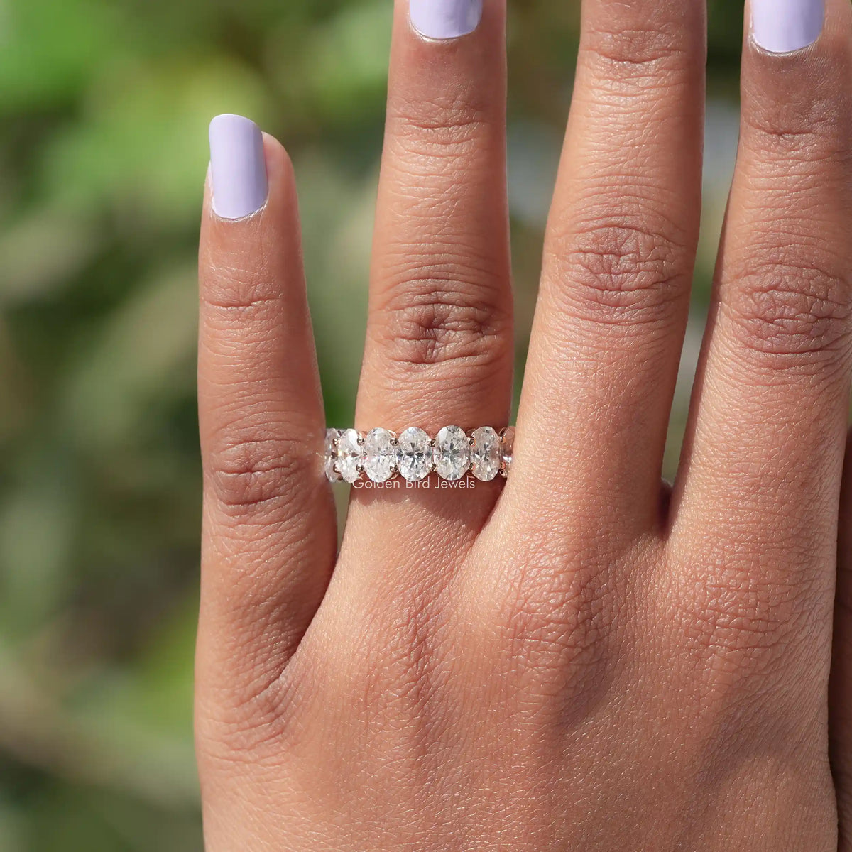 Oval-cut moissanite 3/4 eternity bridal band ring with faceted stones