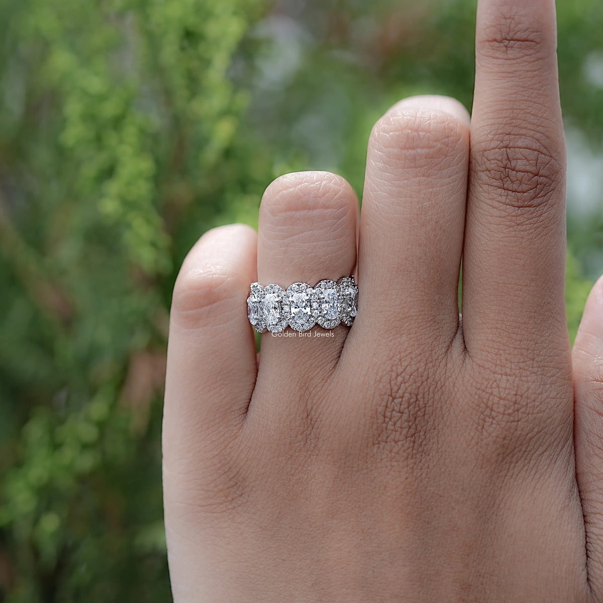 Front view of Oval Cut Lab Diamond Seven Stone Halo Band
