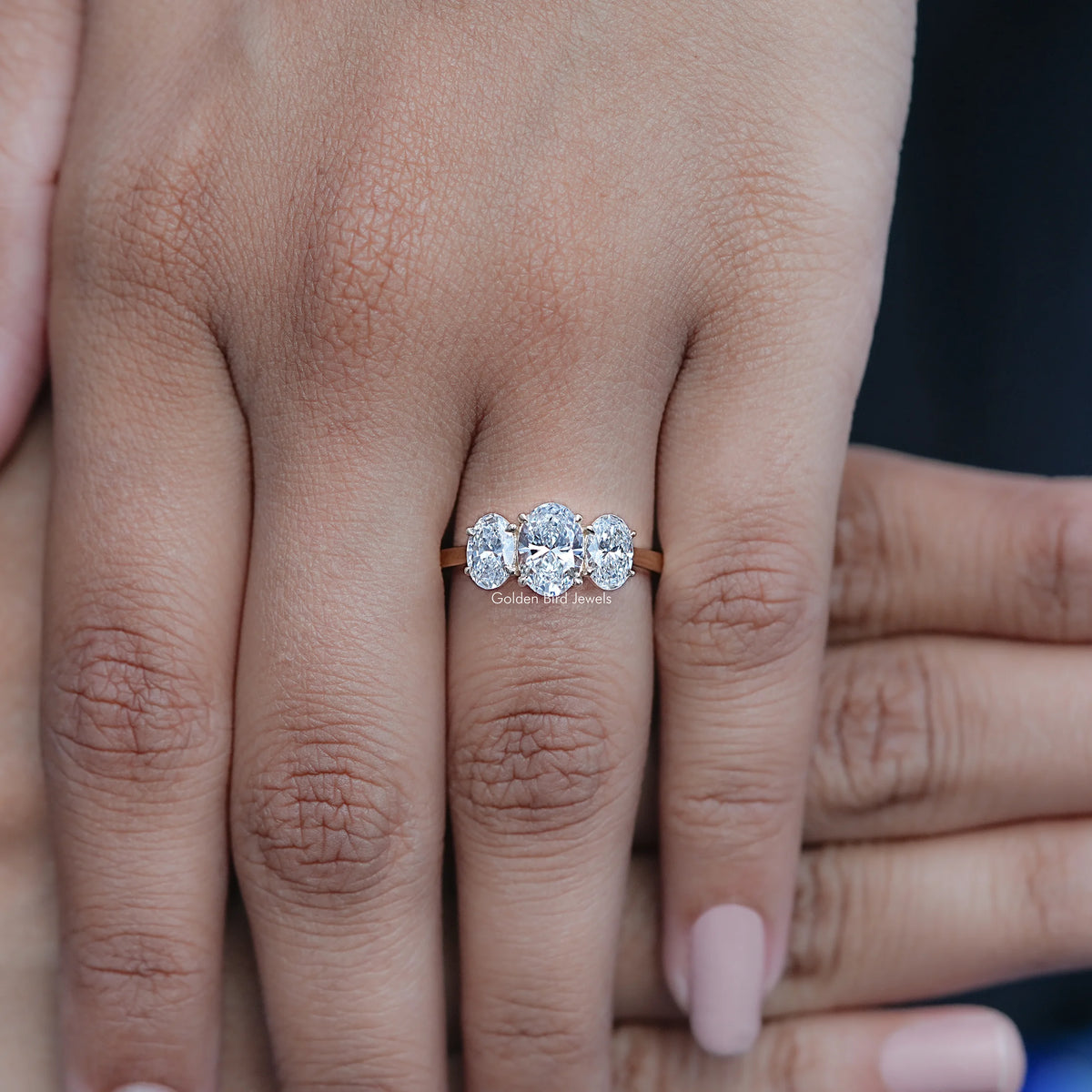 Display view of Oval Cut Lab Diamond Three Stone Engagement Ring
