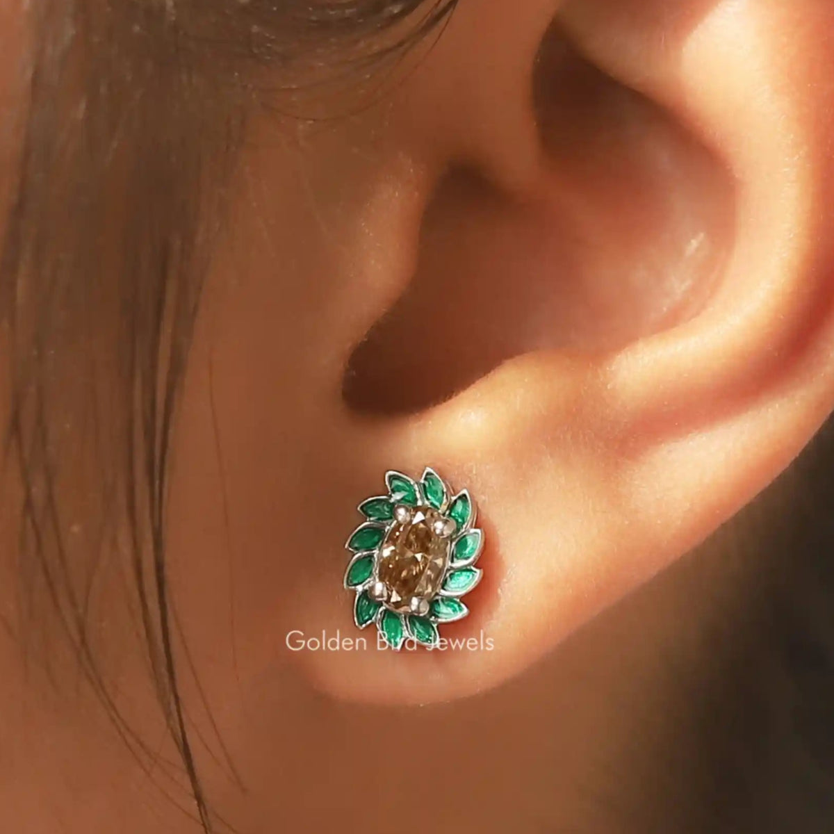 In Ear view of oval Cut moissanite Stud Earrings 			  