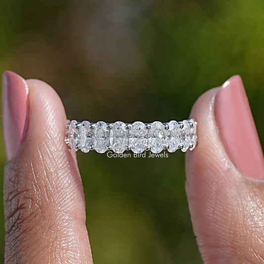 14K white gold oval half eternity band with moissanite stones, front view