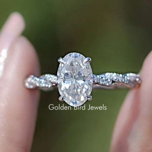 Front view of Oval Shaped Moissanite Twisted Shank Accent Ring