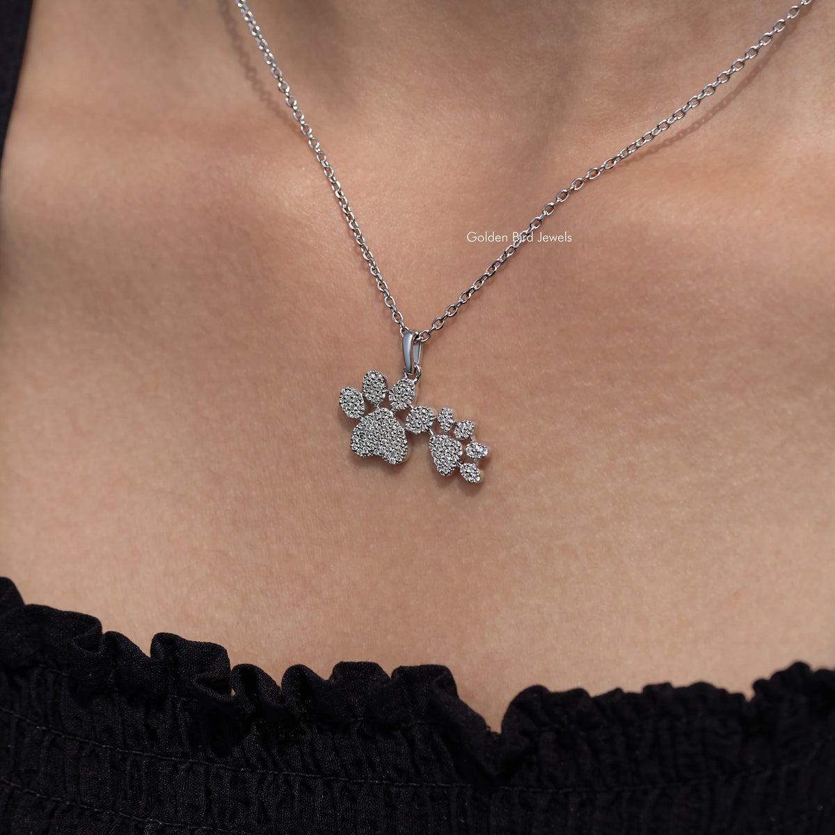 Paw-cluster pendant necklace with three paw prints, round-cut sparkling stones