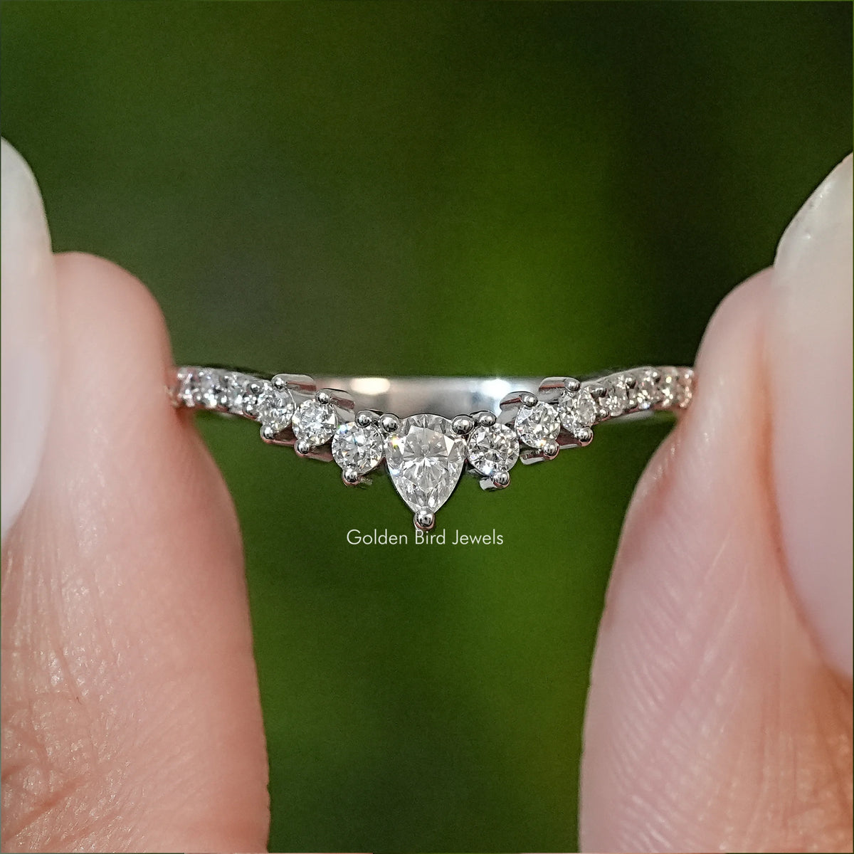 Silver chevron eternity band ring with pear-cut white moissanite stones