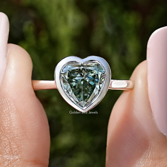 Heart-shaped moissanite bezel promise ring in sterling silver, heart stone close-up