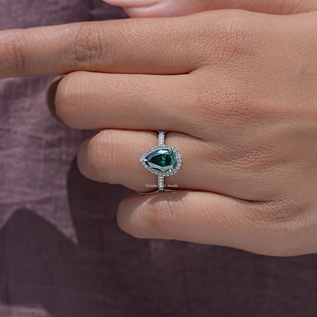 Green pear moissanite halo wedding ring with pavé band