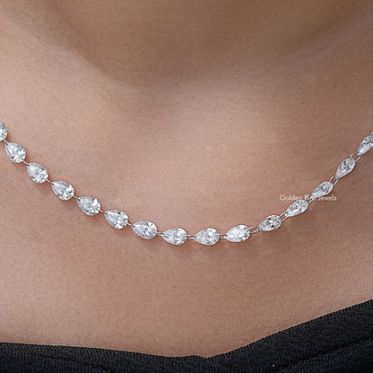 Silver pear-cut diamond tennis necklace with oval link stations