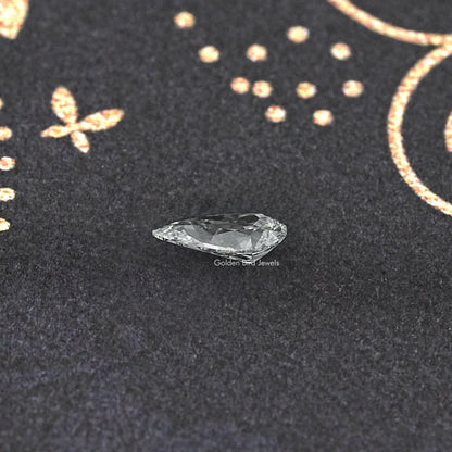 Pear-cut lab-grown diamond, clear white stone viewed from a different angle