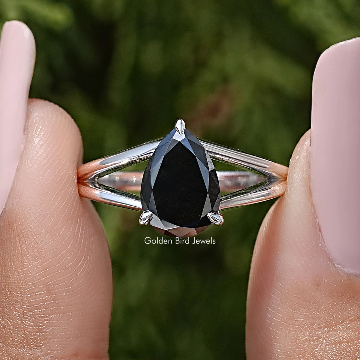 925 sterling silver split-shank ring with pear-cut black moissanite, prong-set