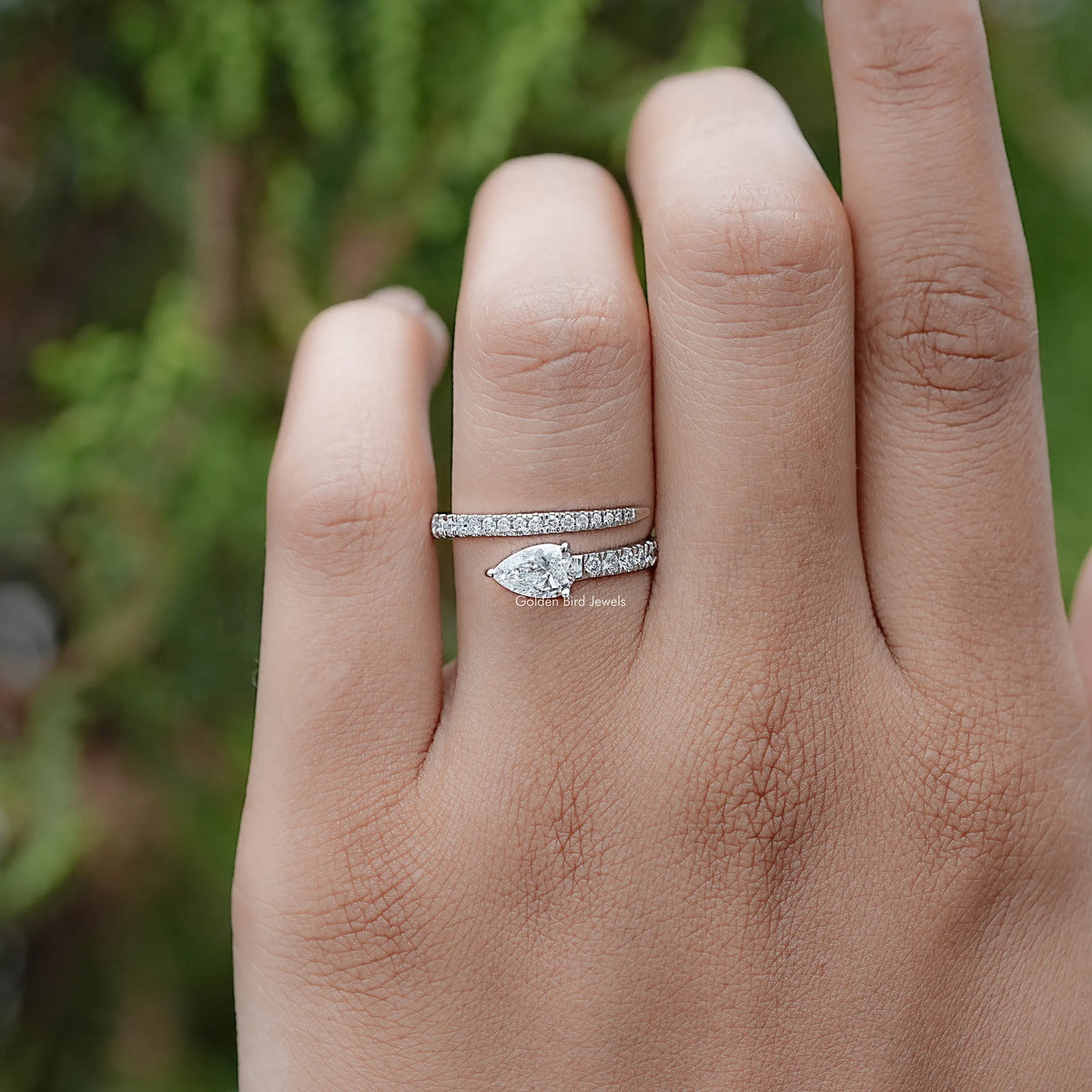Front view of Pear And Round Cut Diamond Cuff Band