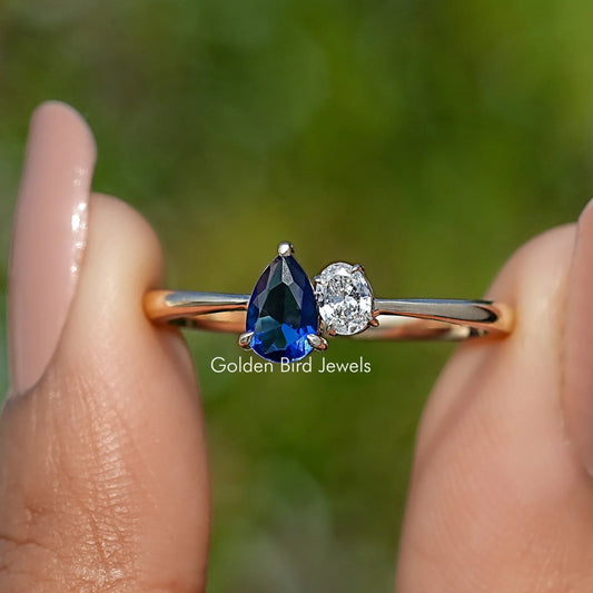 Front View of Pear Cut Blue Gemstone Toi Et Moi Ring
