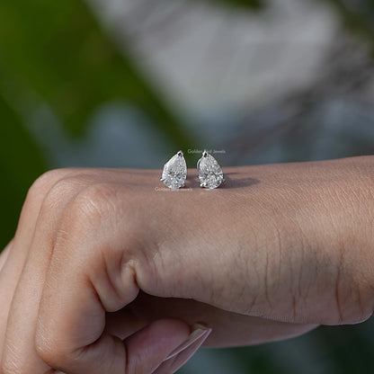 In Hand View Of 2CTW pear Cut  Solitaire Stud Earring 