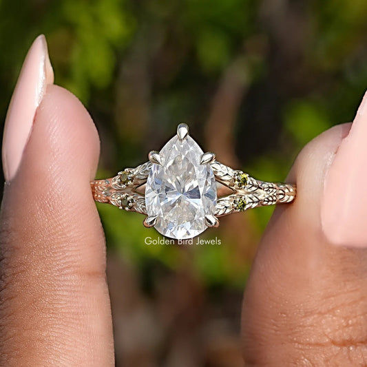Front View of Pear Cut Moissanite Accent Engagement Ring
