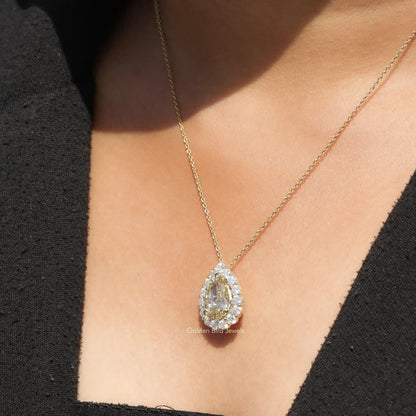 In neck view of Pear cluster moissanite halo pendant 
