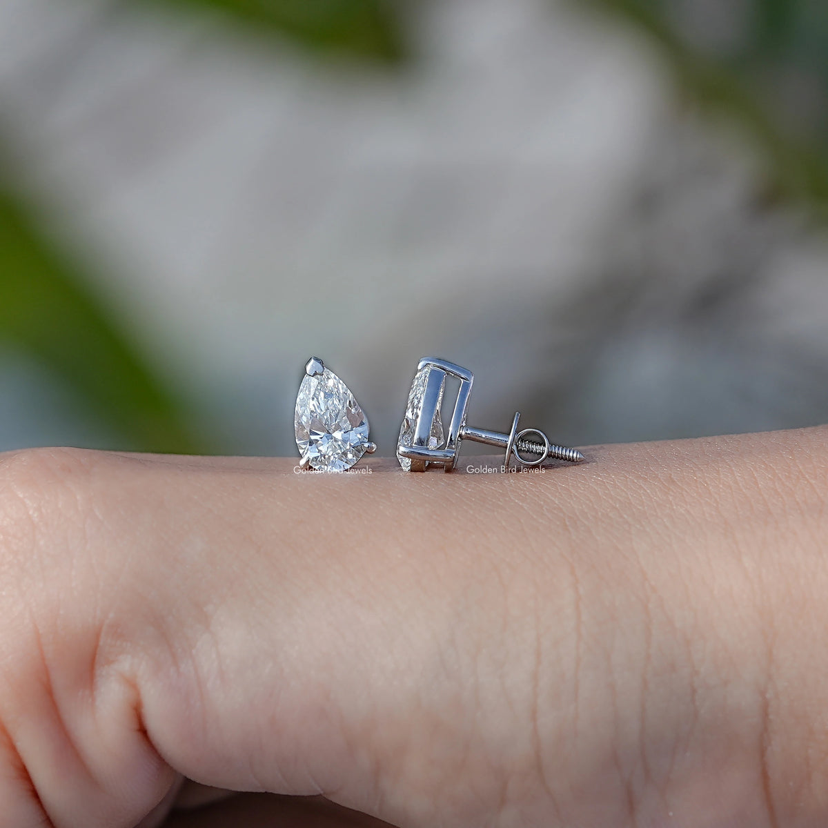 Front And Back Side View Of pear Cut diamond Stud Earrings 