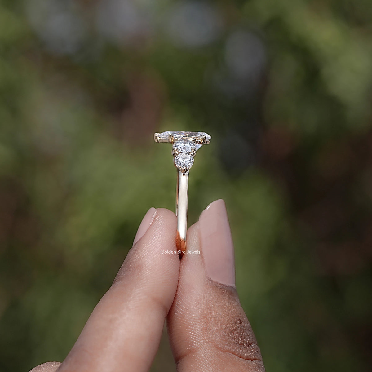 Side View of Pear Cut Lab Diamond Five Stone Ring