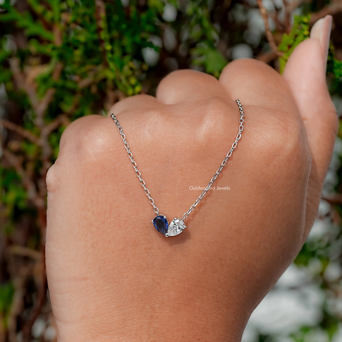 hand Showing View of Gemstone Toi Moi Engagement Pendant
