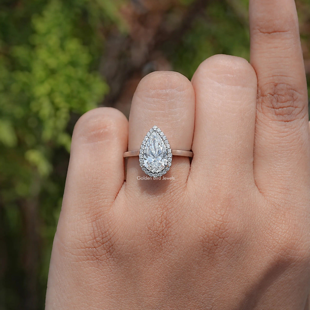 Top View Of Pear shaped diamond engagement ring 
