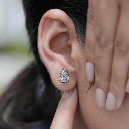 Display view of Stud Earrings with Pear Shaped Bezel Set Lab Diamond