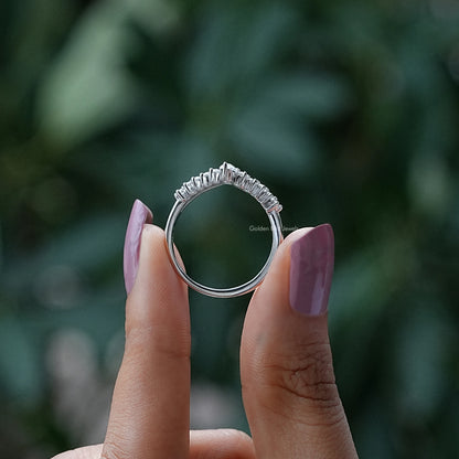 Silver round-collared chevron wedding band, top view with prong-set stones