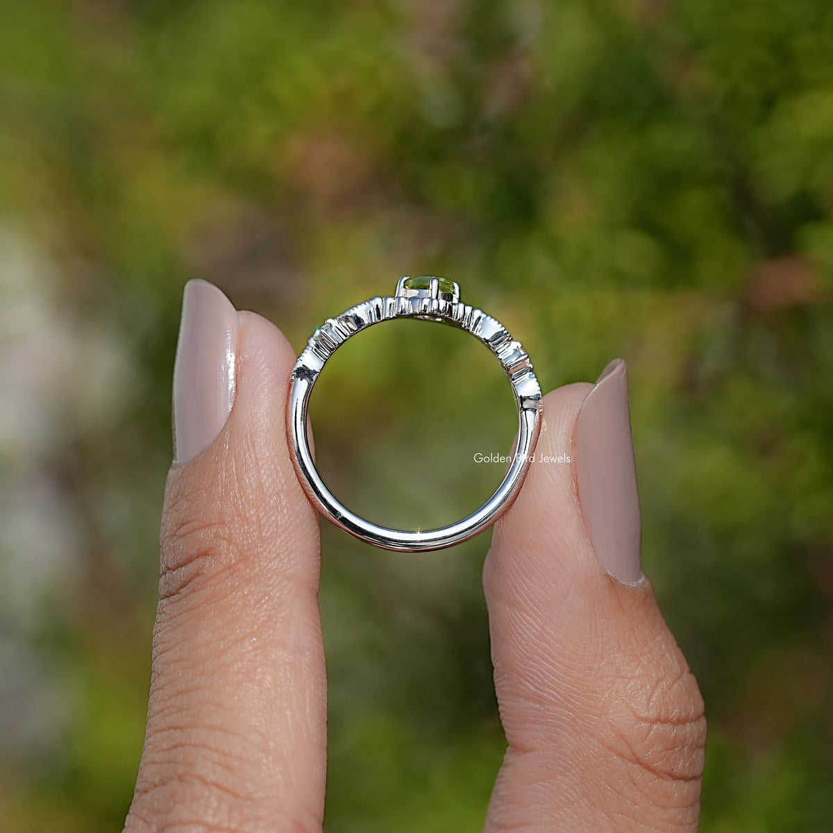 Silver ring band with prong setting, underside view