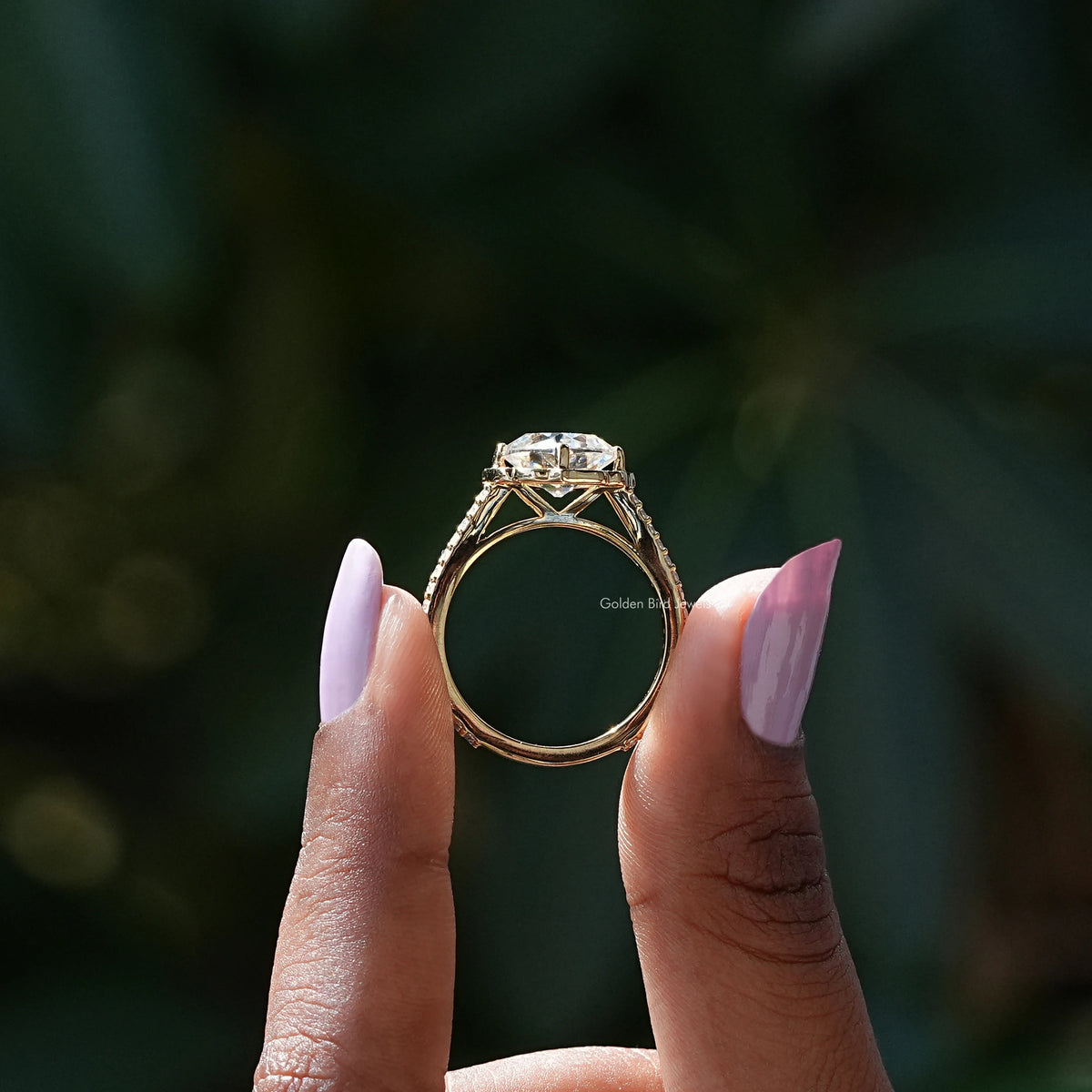 Back View of Peruzzi Cut Moissanite Halo Ring In two fingers