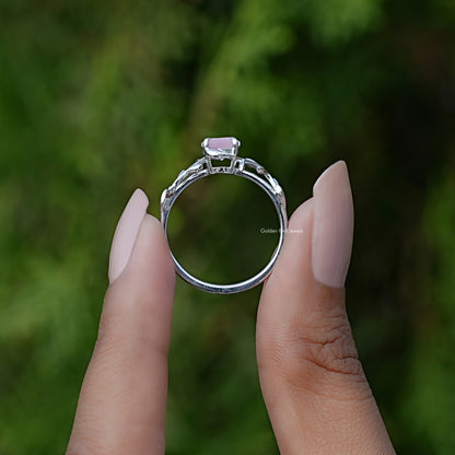 Rose quartz round gemstone leaf ring with silver band, front view