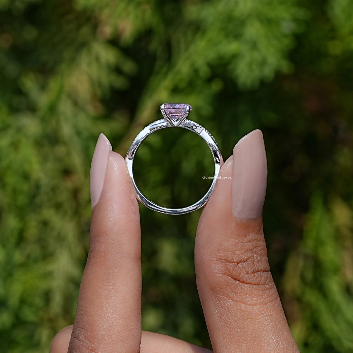 Sterling silver round pink gemstone ring, shown front view