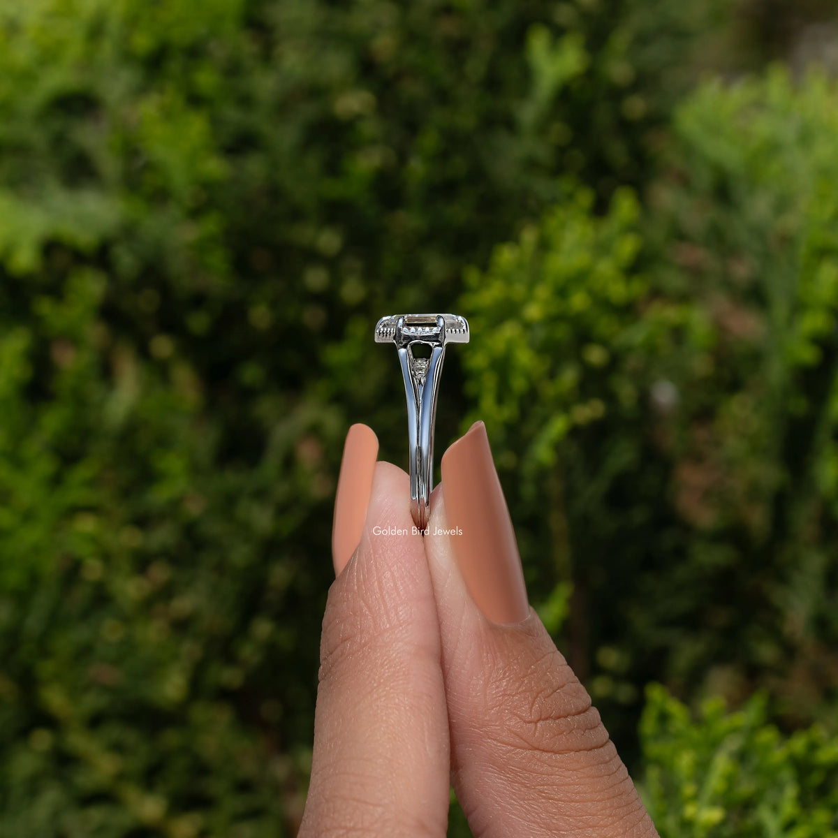 Hexagon-cut moissanite ring with four-prong halo bezel, silver-toned band
