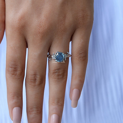 Close-Up View of Round Cut Moissanite Engagement Ring In White Gold