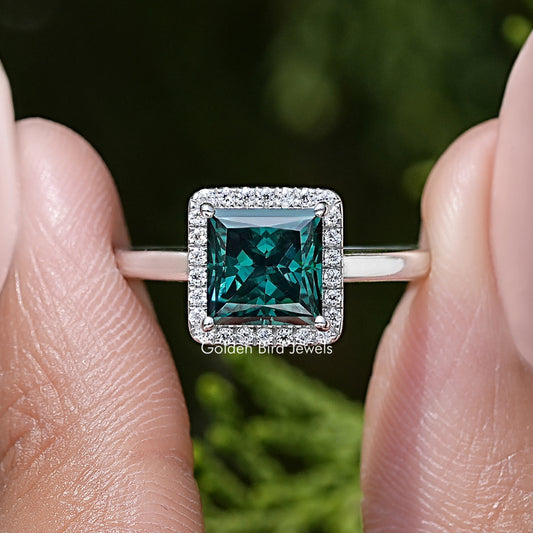 925 sterling silver halo square teal moissanite engagement ring on fingers