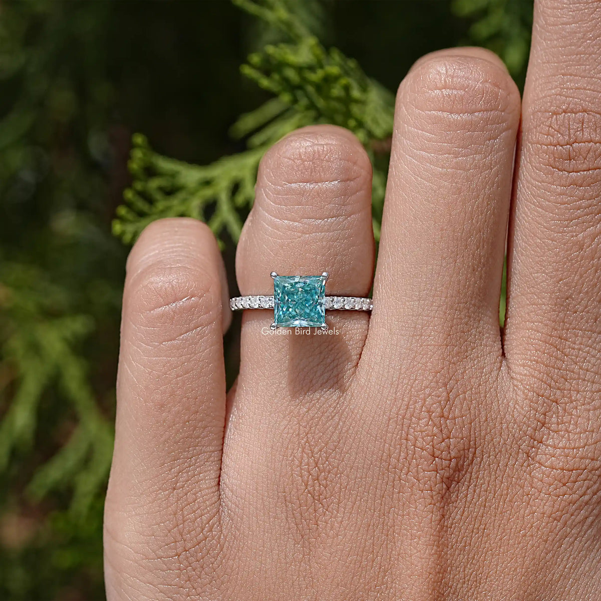 Princess cut moissanite solitaire wedding ring with pavé band in sterling silver