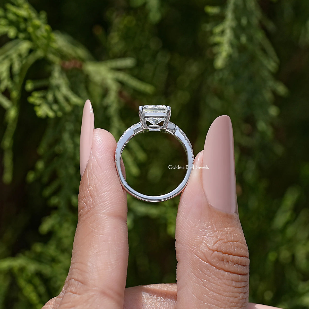 Sterling silver engagement ring with square moissanite center and twisted band accents