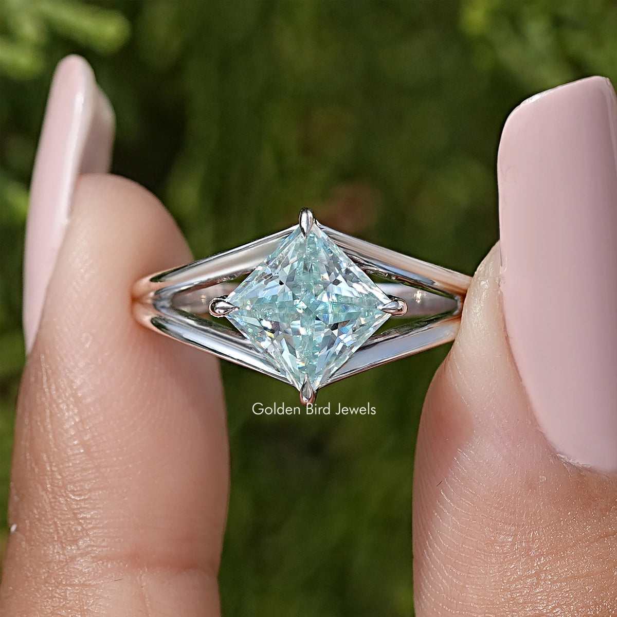 Sterling silver split-shank moissanite ring with large princess-cut center stone close-up