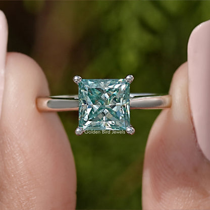 Princess-cut moissanite solitaire ring in silver with square light-blue center stone
